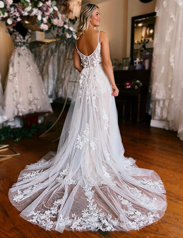 Robe de mariage en tulle blanc avec applications