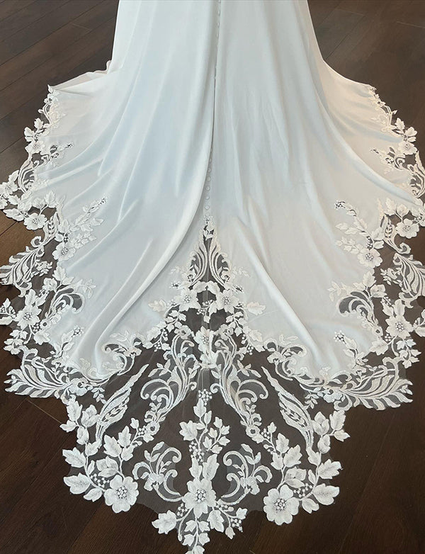 Robe de mariée longue à épaules dégagées