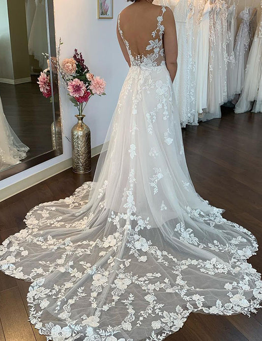 Robe de mariée sexy à encolure en V profonde et fendue sur le côté avec appliques en dentelle