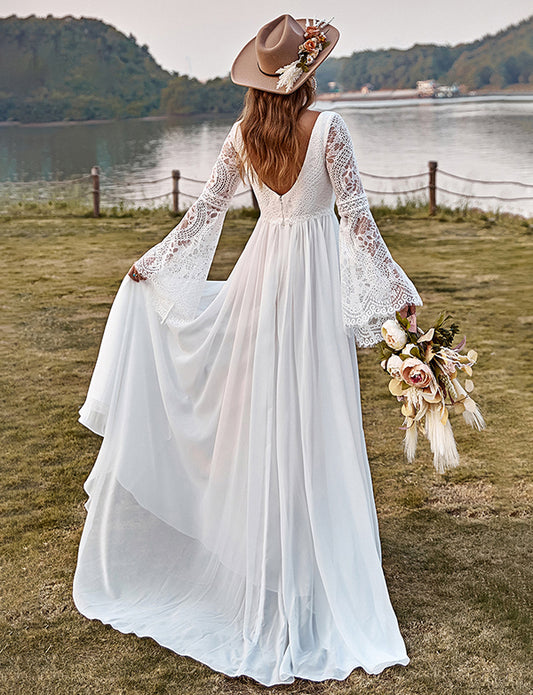 Robe de mariée boho en mousseline de dentelle ivoire à manches trompettes