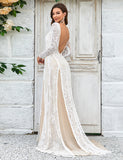 Robe de mariée à manches longues et traîne en dentelle