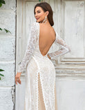 Robe de mariée à manches longues et traîne en dentelle
