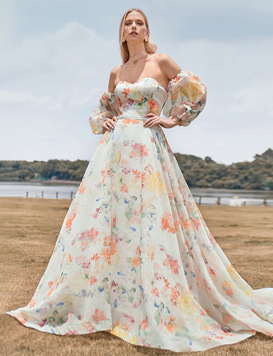 Robe de mariée à traîne florale ivoire avec manches