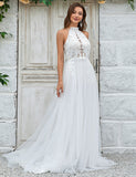Robe de mariée à traîne en tulle et dentelle, dos ouvert, ivoire