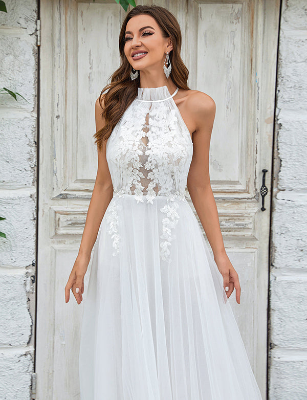 Robe de mariée à traîne en tulle et dentelle, dos ouvert, ivoire