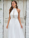 Robe de mariée à traîne en tulle et dentelle, dos ouvert, ivoire