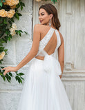 Robe de mariée à traîne en tulle et dentelle, dos ouvert, ivoire