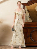 Robe de la mère de la mariée avec perles dorées et étincelantes