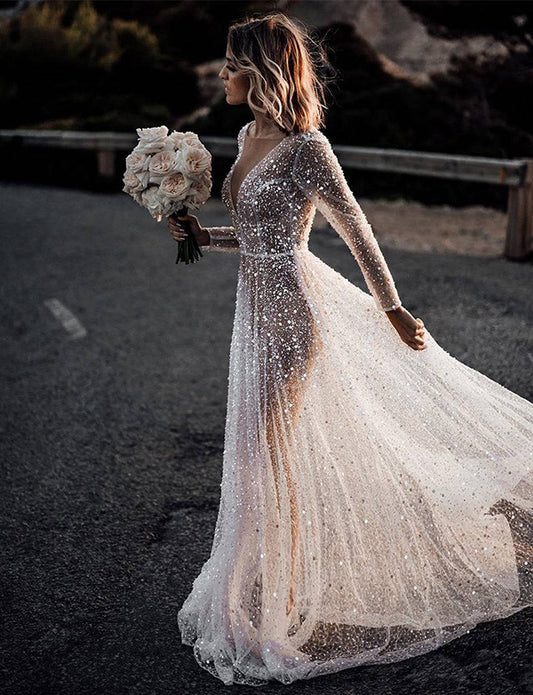 Robe de mariée à manches longues avec paillettes