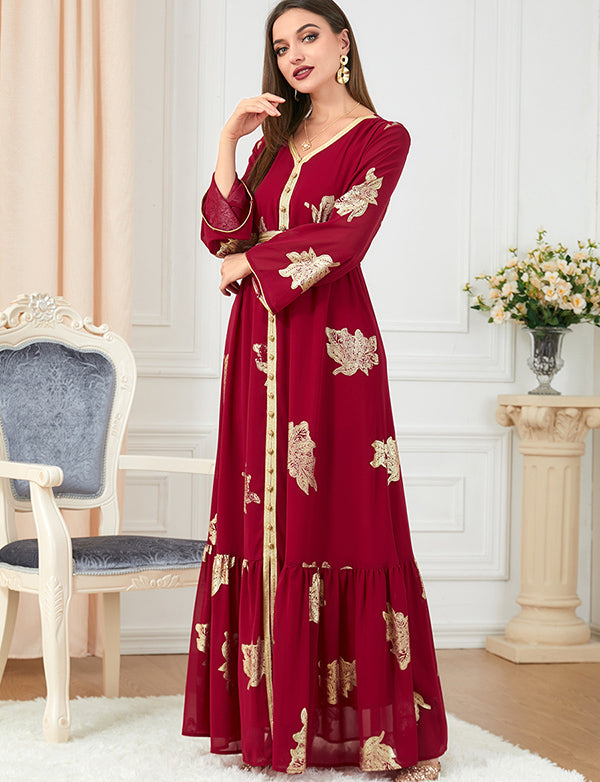 Robe dorée à la mode à manches longues et col en V