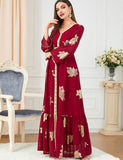 Robe dorée à la mode à manches longues et col en V